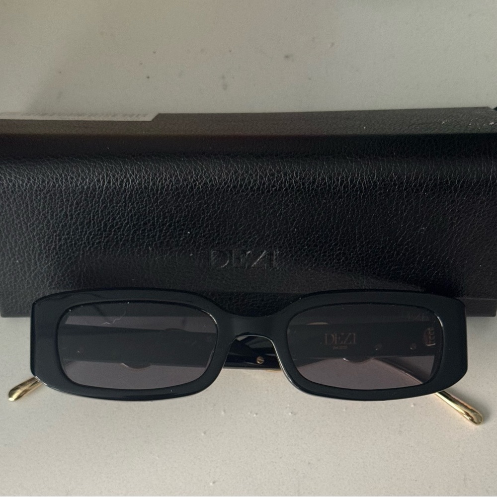 DEZI Black “Lil Trippy” Sunglasses with Gold Temples and Smoke Lenses